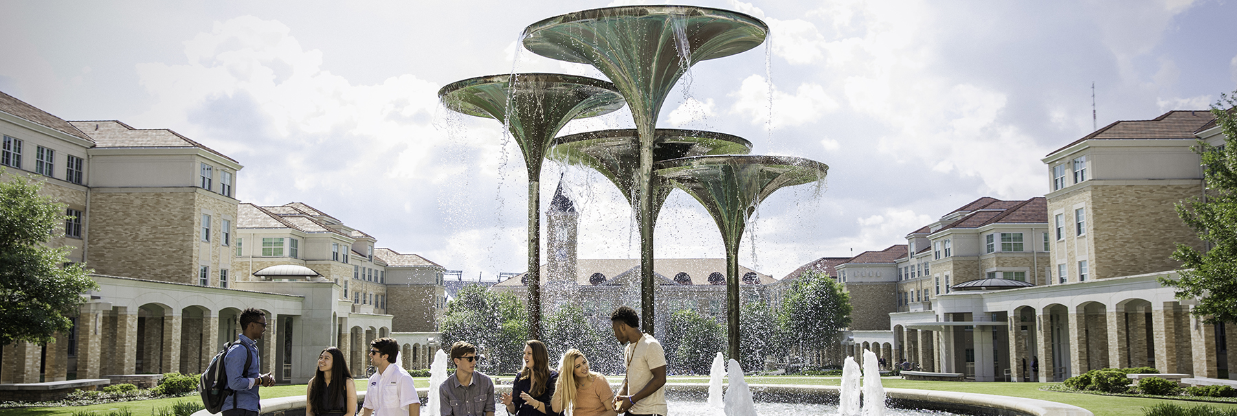 Section Image: Students around Frog Fountian 